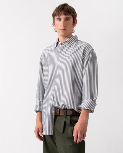 model wearing a BOSS Orange Ricoplus Mens Long Sleeve Oxford Shirt in Dark Blue 404