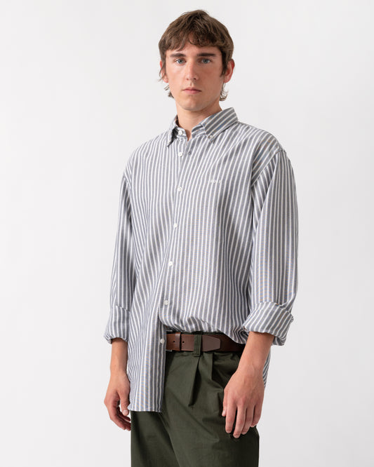 model wearing a BOSS Orange Ricoplus Mens Long Sleeve Oxford Shirt in Dark Blue 404