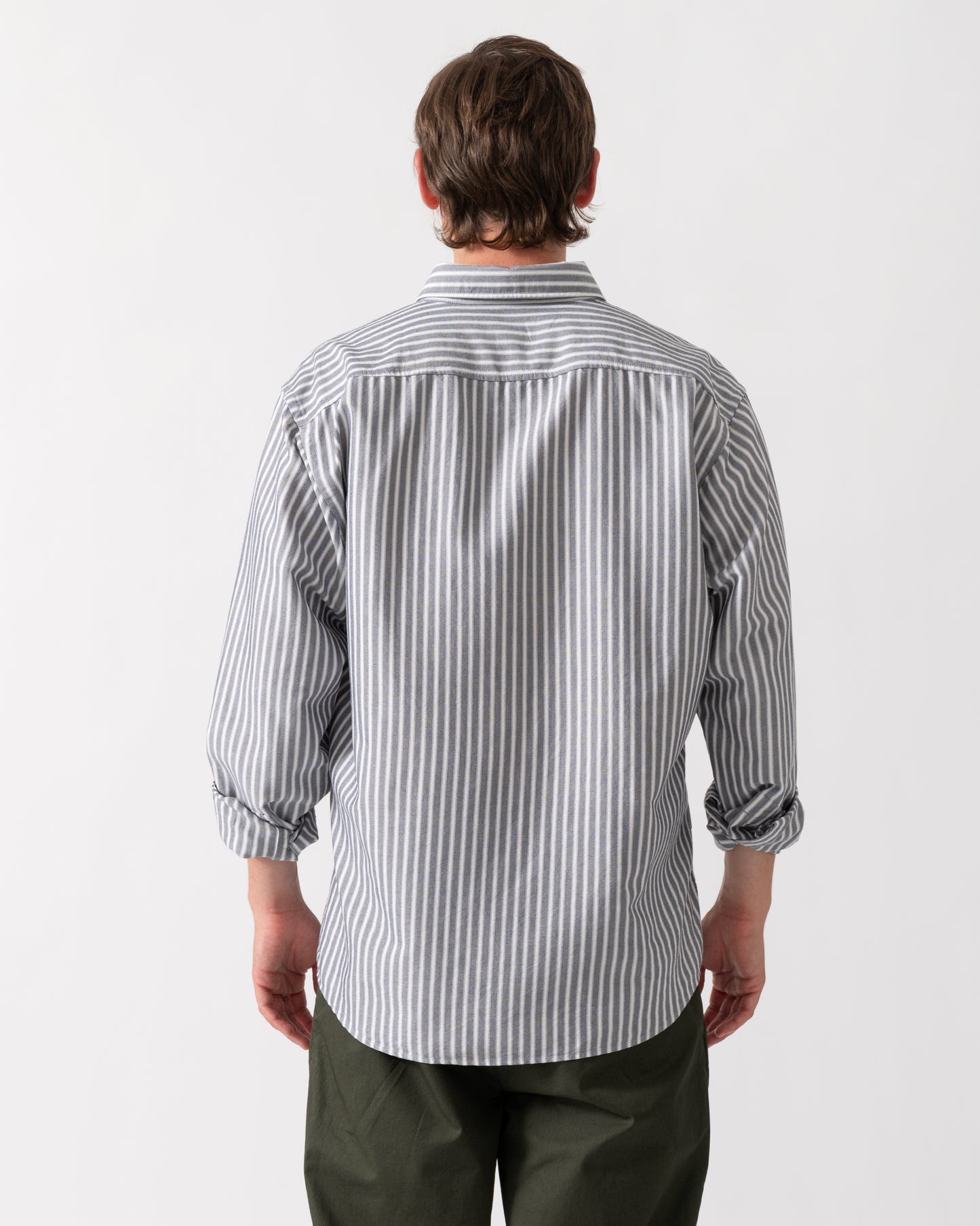 back of model wearing a BOSS Orange Ricoplus Mens Long Sleeve Oxford Shirt in Dark Blue 404