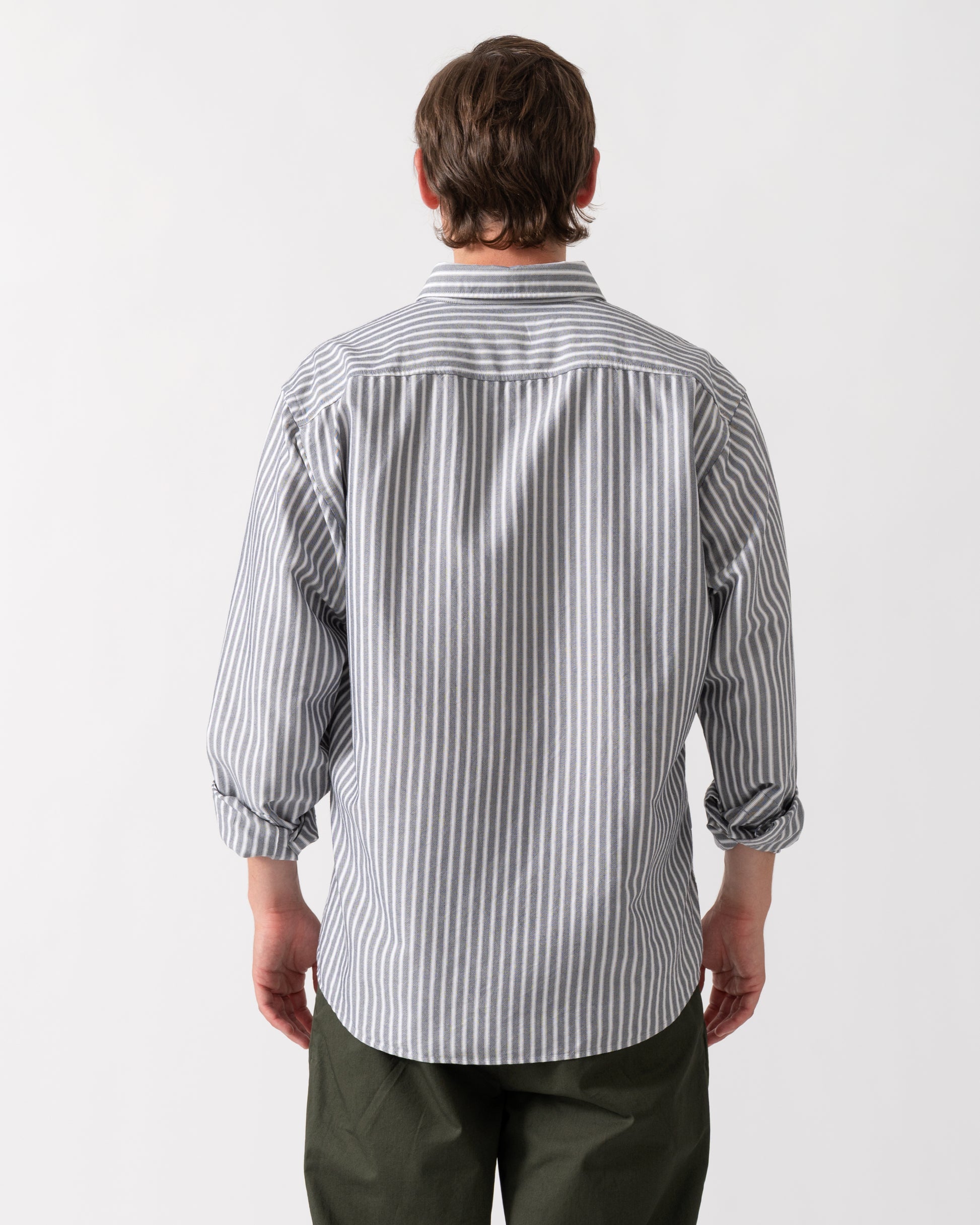 back of model wearing a BOSS Orange Ricoplus Mens Long Sleeve Oxford Shirt in Dark Blue 404