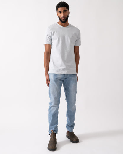 full length shot of a model wearing a BOSS Orange Tales Mens Cotton-Jersey T-shirt With Logo Patch in Light-Pastel Grey