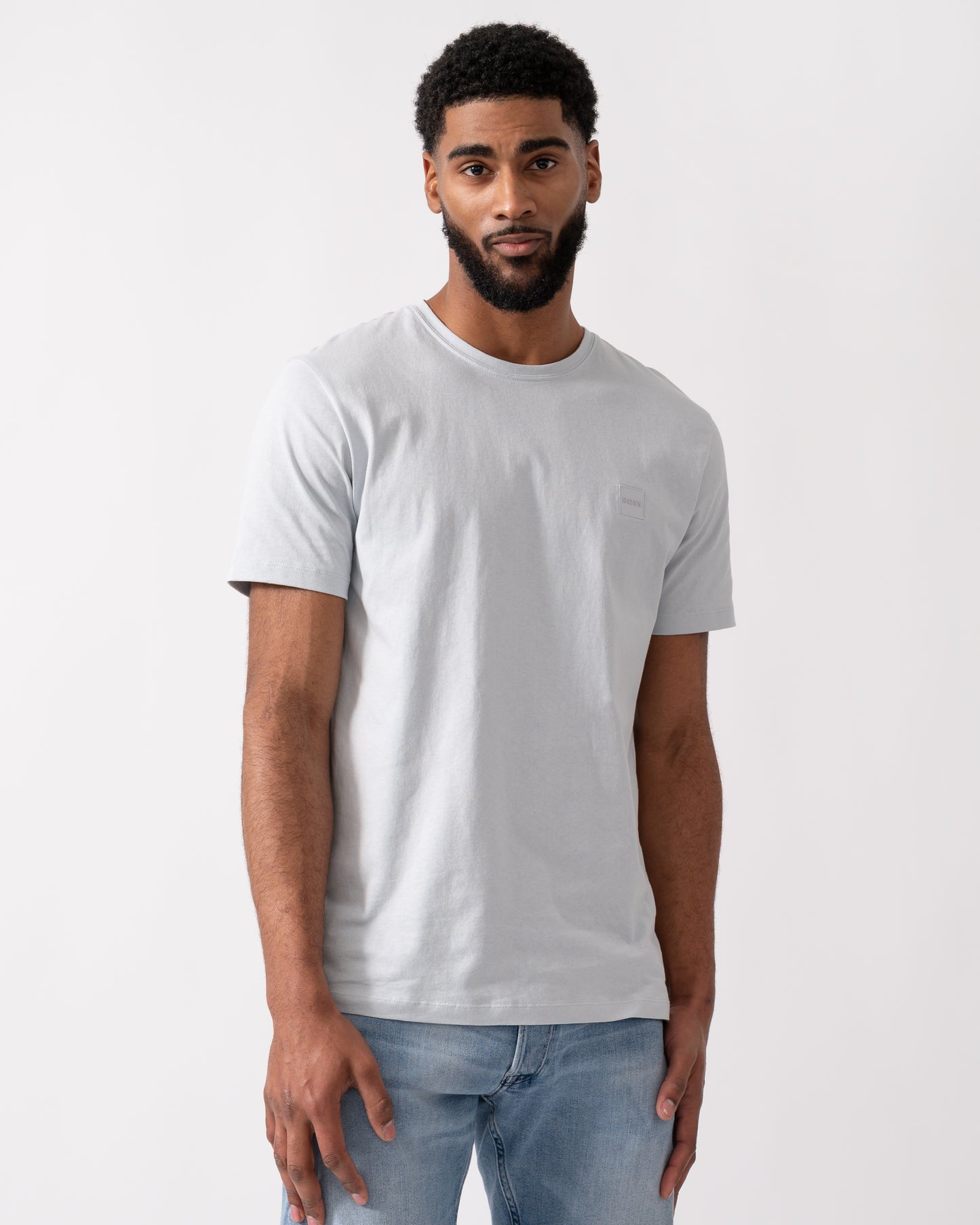 model wearing a BOSS Orange Tales Mens Cotton-Jersey T-shirt With Logo Patch in Light-Pastel Grey