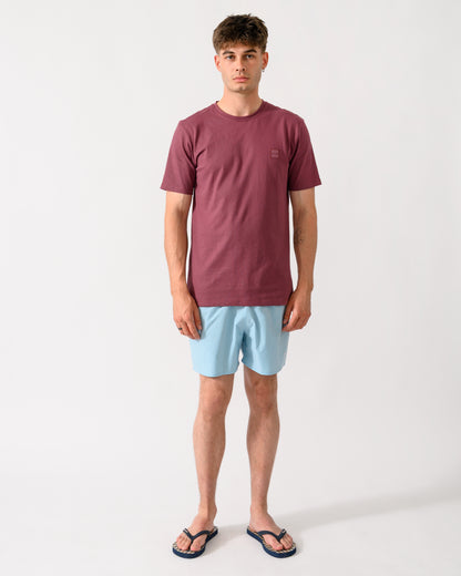 full length shot of a model wearing a BOSS Orange Tales Mens Cotton-Jersey T-shirt With Logo Patch in Medium Red 618
