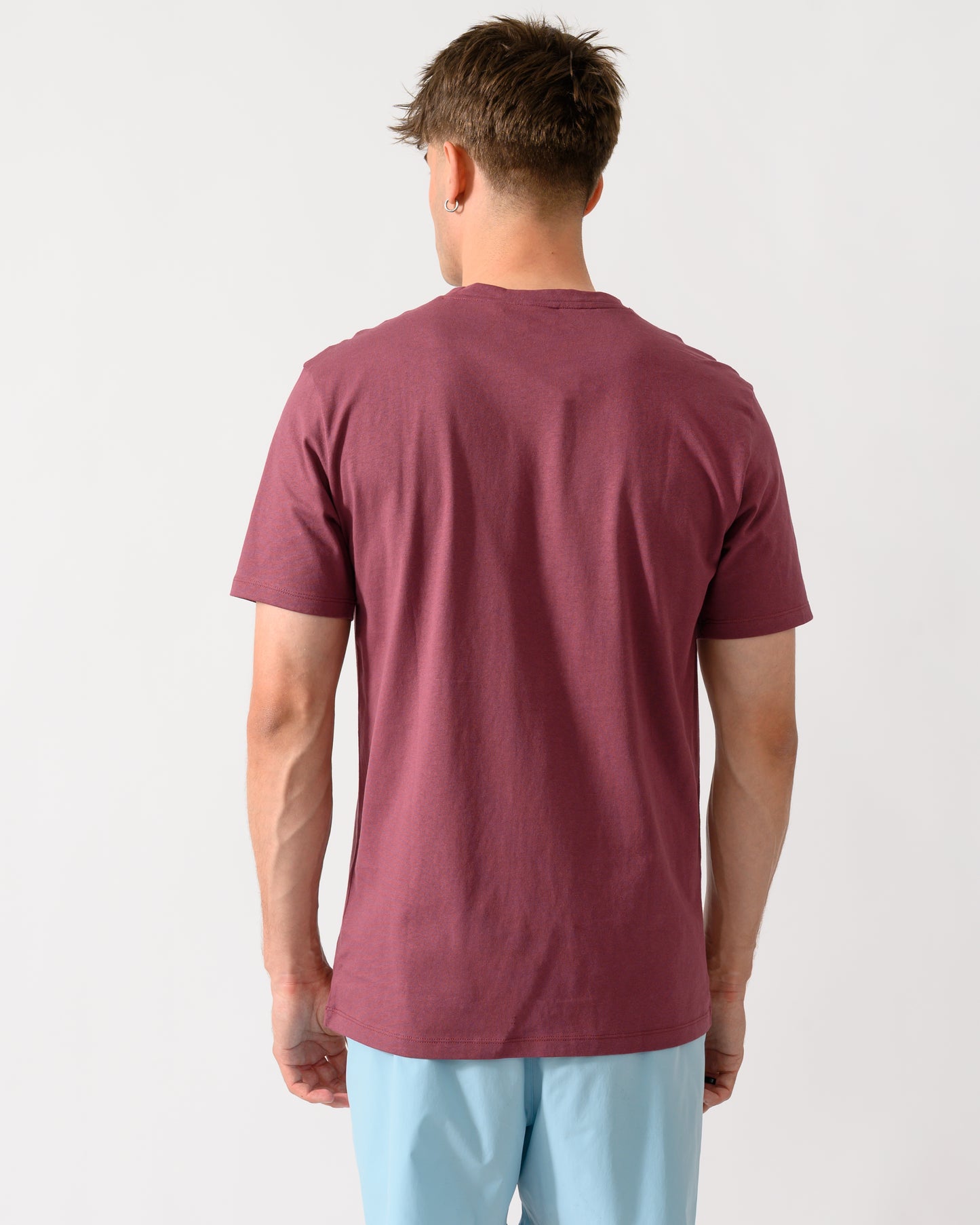 back shot of a model wearing a BOSS Orange Tales Mens Cotton-Jersey T-shirt With Logo Patch in Medium Red 618