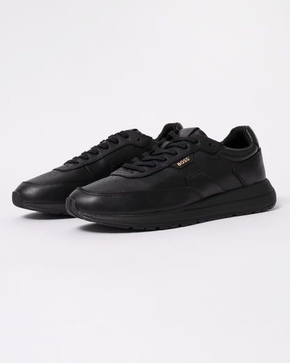 Studio photograph showing BOSS Orange Vinston_Runn_butb Mens Trainers in Black 005
