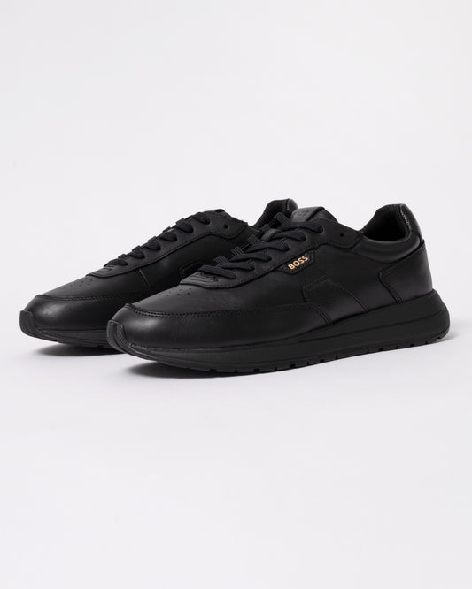 Studio photograph showing BOSS Orange Vinston_Runn_butb Mens Trainers in Black 005