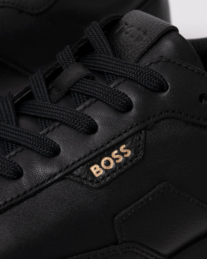 Studio photograph showing close up of BOSS Orange Vinston_Runn_butb Mens Trainers in Black 005