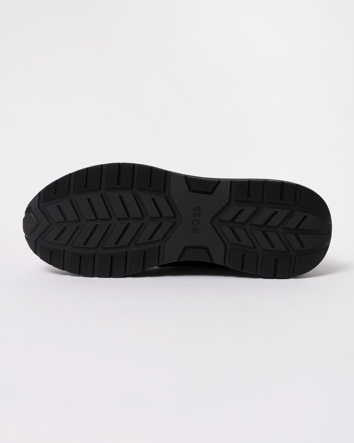 Studio photograph showing sole of BOSS Orange Vinston_Runn_butb Mens Trainers in Black 005