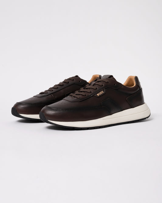 Studio photograph showing BOSS Orange Vinston_Runn_butb Mens Trainers in Dark Brown 201