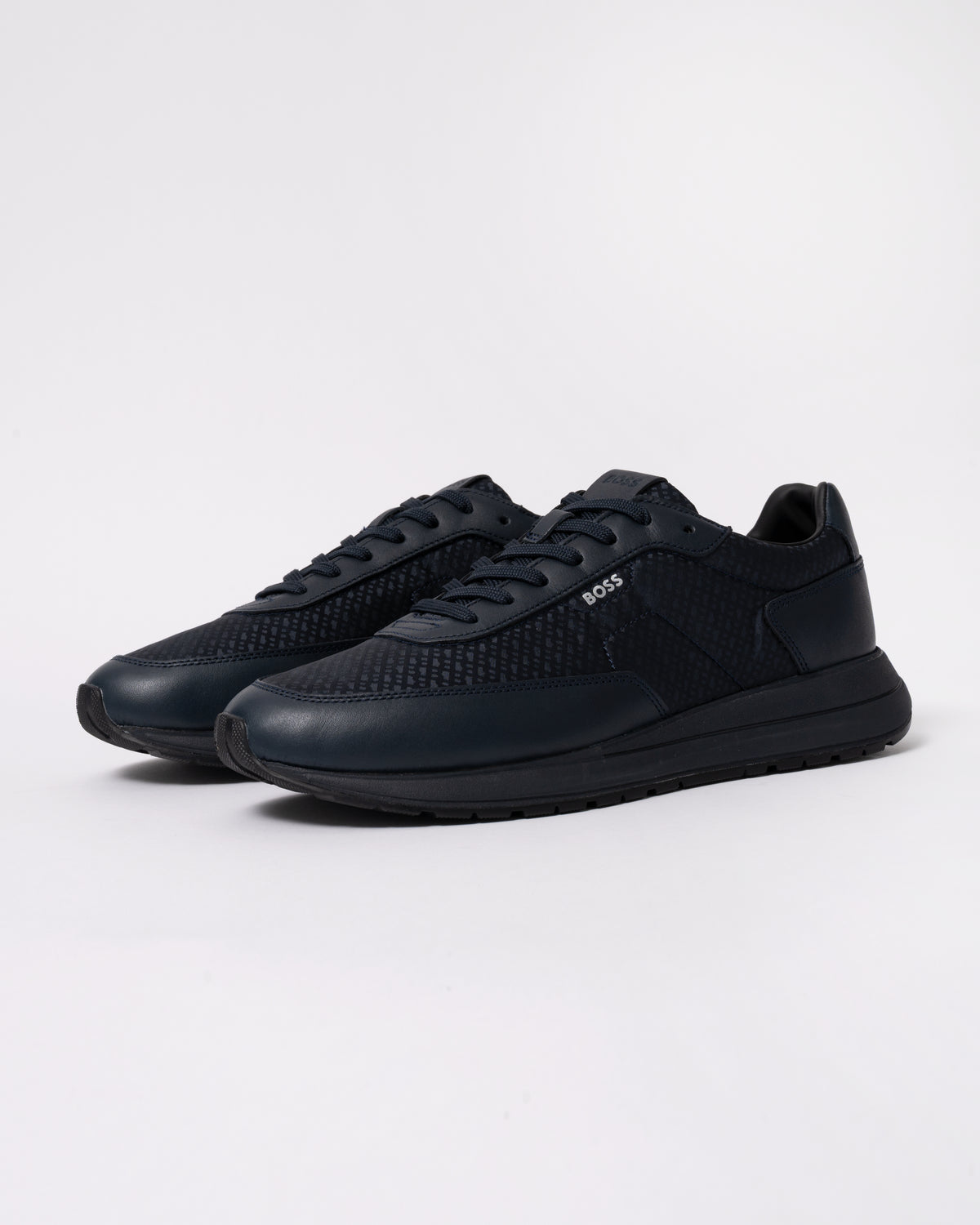 Studio photograph showing BOSS Orange Vinston_Runn_nymnlt Mens Trainers in Dark Blue 405