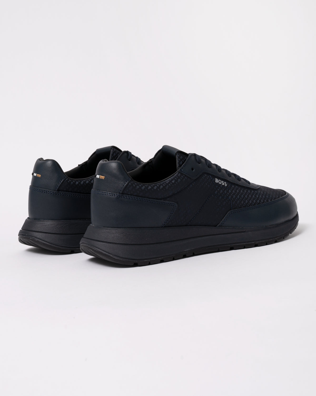 Studio photograph showing back of BOSS Orange Vinston_Runn_nymnlt Mens Trainers in Dark Blue 405