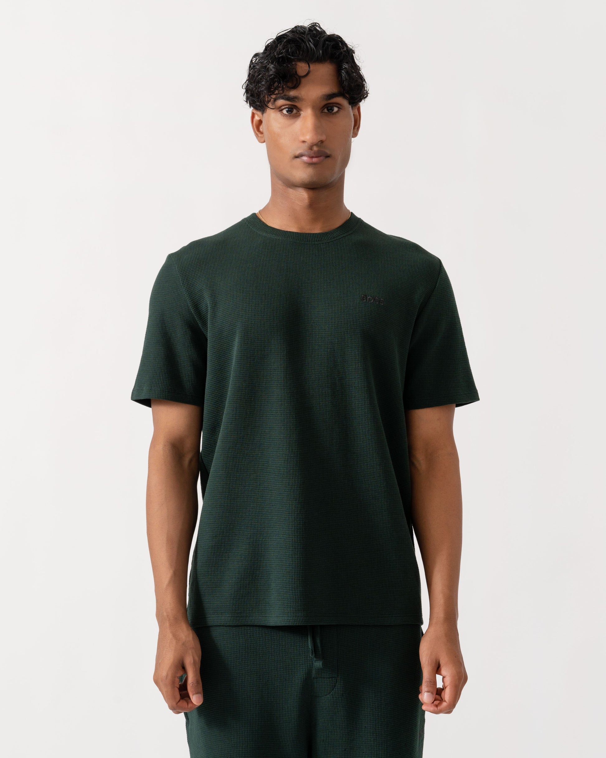 Man wearing BOSS Orange Waffle Mens Cotton-Blend Pyjama T-Shirt with Embroidered Logo - Dark Green 308