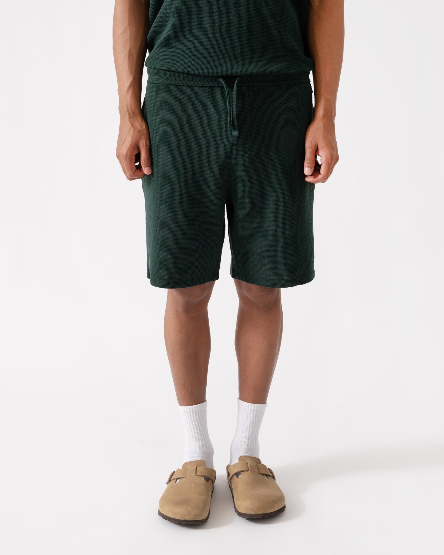 Man wearing BOSS Orange Waffle Mens Cotton Blend Waffle Structure Pyjama Shorts with Embroidered Logo - Dark Green 308