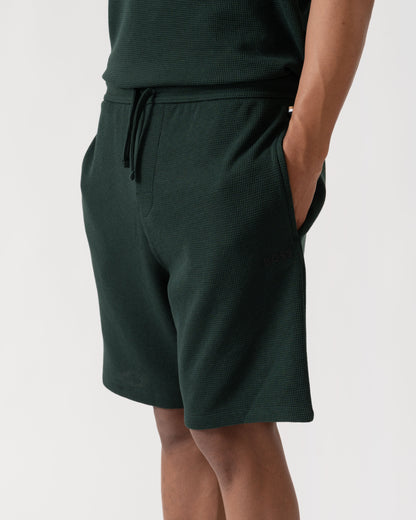 Detail shot of BOSS Orange Waffle Mens Cotton Blend Waffle Structure Pyjama Shorts with Embroidered Logo - Dark Green 308