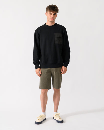 full length shot of a model wearing a BOSS Orange We Urban Mens Crew Neck Sweatshirt with Pocket in Black 001