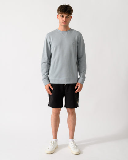 full length shot of a model wearing a BOSS Orange Westart Mens Crew Neck Sweatshirt With Logo Patch in Open Grey 084