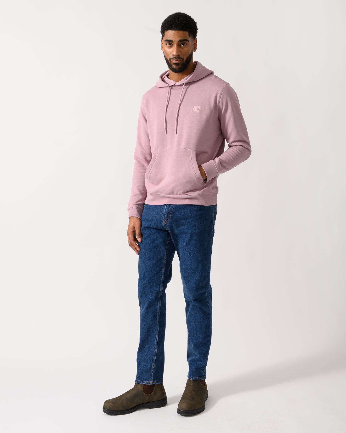 Full length shot of a Model wearing a BOSS Orange Wetalk Mens Pullover Hoodie With Logo Patch in Light/Pastel Purple