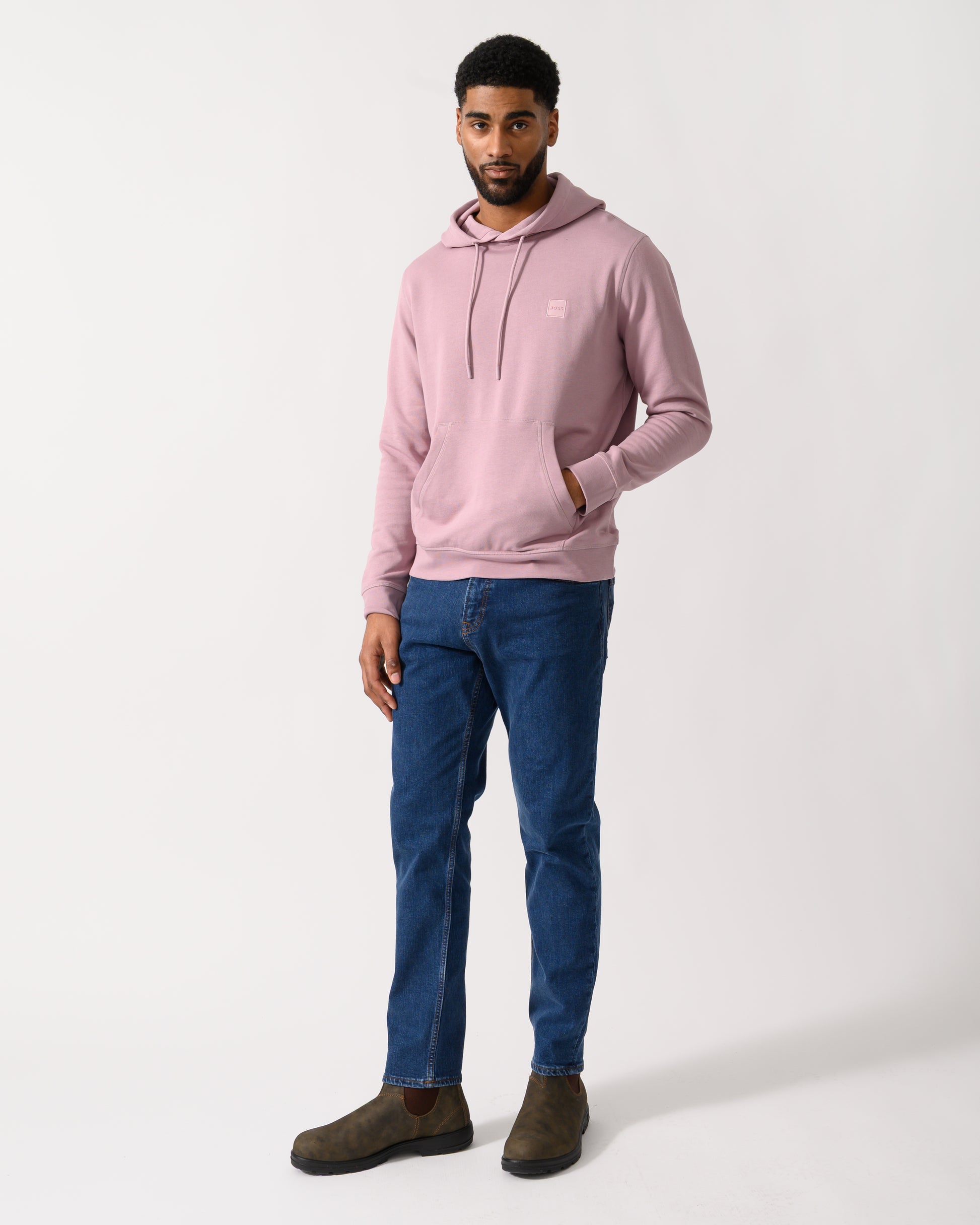 Full length shot of a Model wearing a BOSS Orange Wetalk Mens Pullover Hoodie With Logo Patch in Light/Pastel Purple