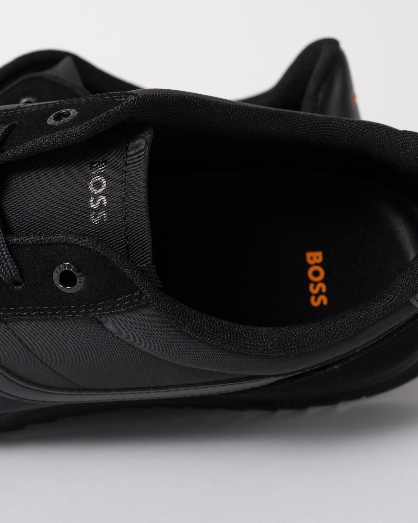 close up of BOSS Orange Zayn Mens Logo Trainers with Faux Suede Trims in Black 005