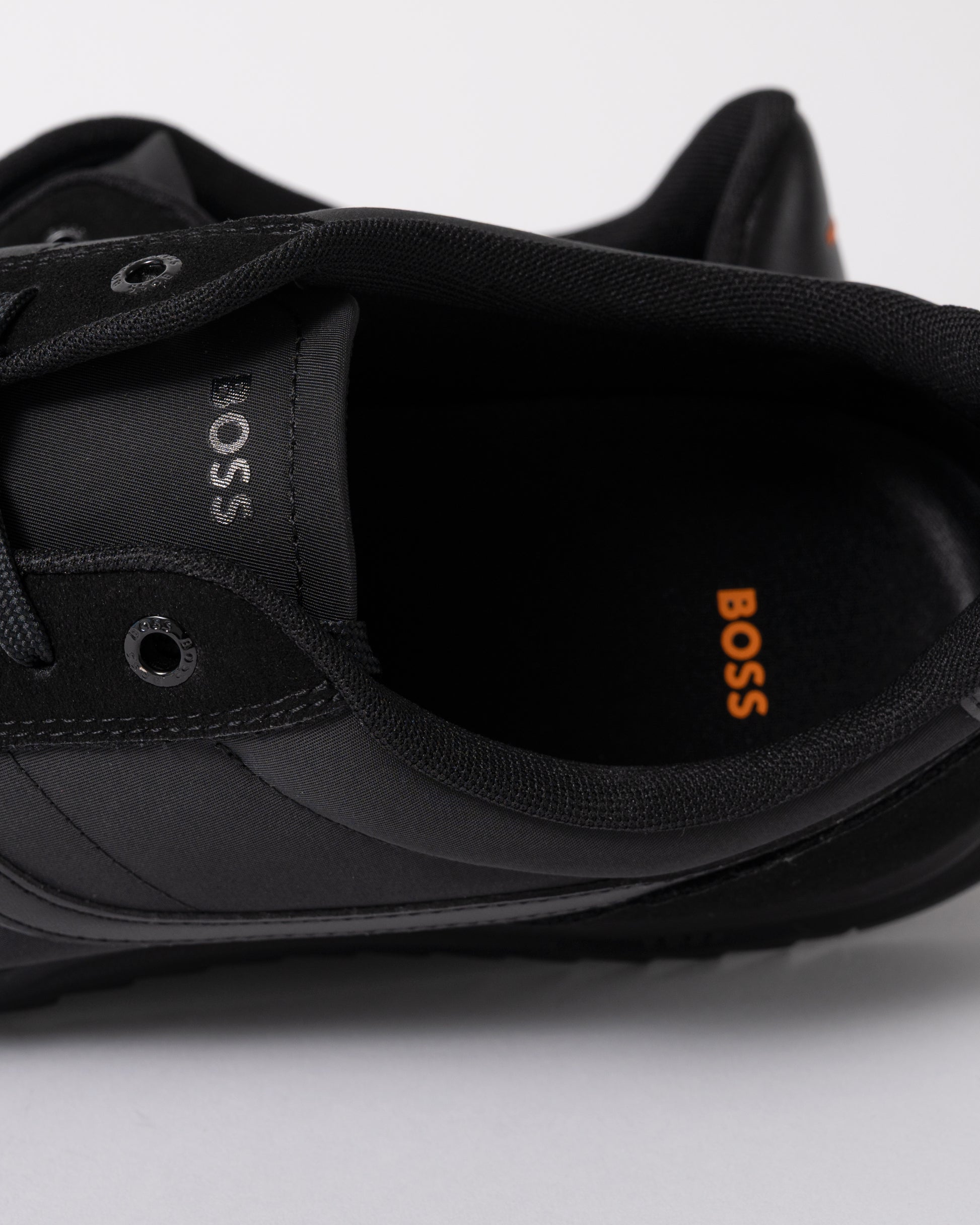 close up of BOSS Orange Zayn Mens Logo Trainers with Faux Suede Trims in Black 005