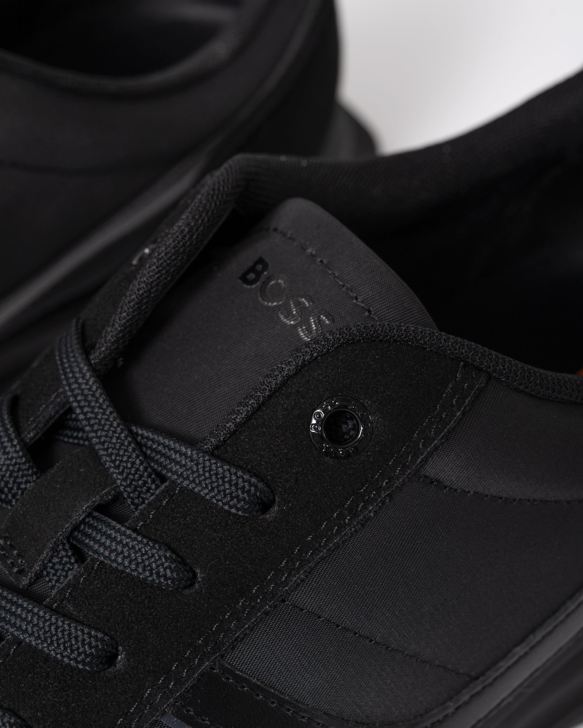 detail of BOSS Orange Zayn Mens Logo Trainers with Faux Suede Trims in Black 005