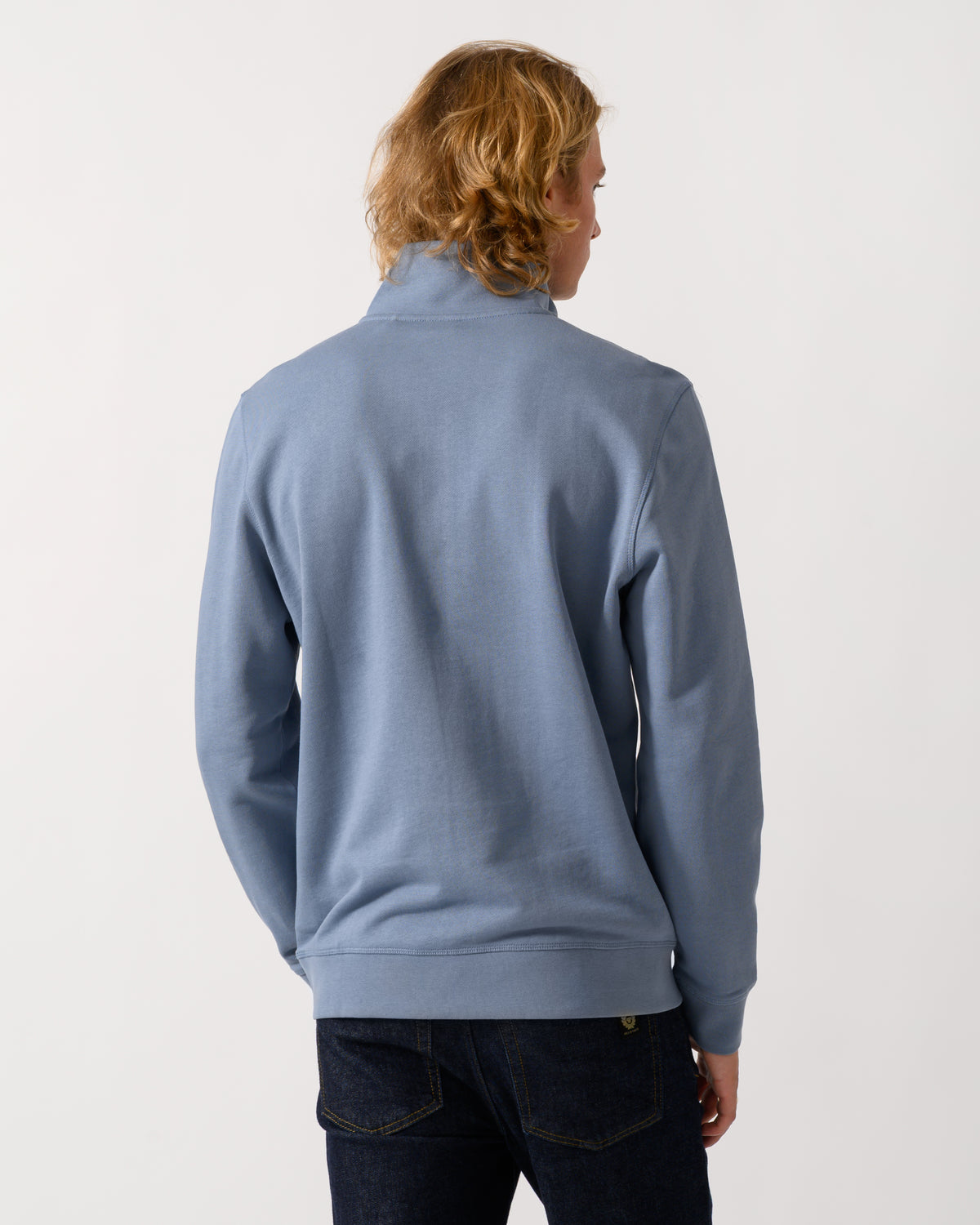 back of model wearing a BOSS Orange Zetrust Mens 1/4 Zip Sweatshirt in Medium Blue 424