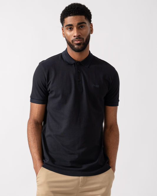 Model wearing BOSS Green Mens Paddy Cotton-Piqué Polo Shirt with Contrast Logo in Dark Blue 408 - Main