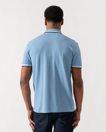 Model wearing BOSS Green Mens Paddy Cotton-Piqué Polo Shirt with Contrast Logo in Open Blue 469 - back