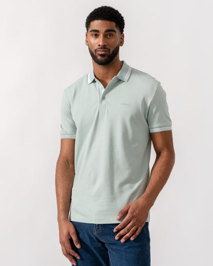 Model wearing BOSS Green Mens Paddy Cotton-Piqué Polo Shirt with Contrast Logo in Turquoise/Aqua 448 - Main