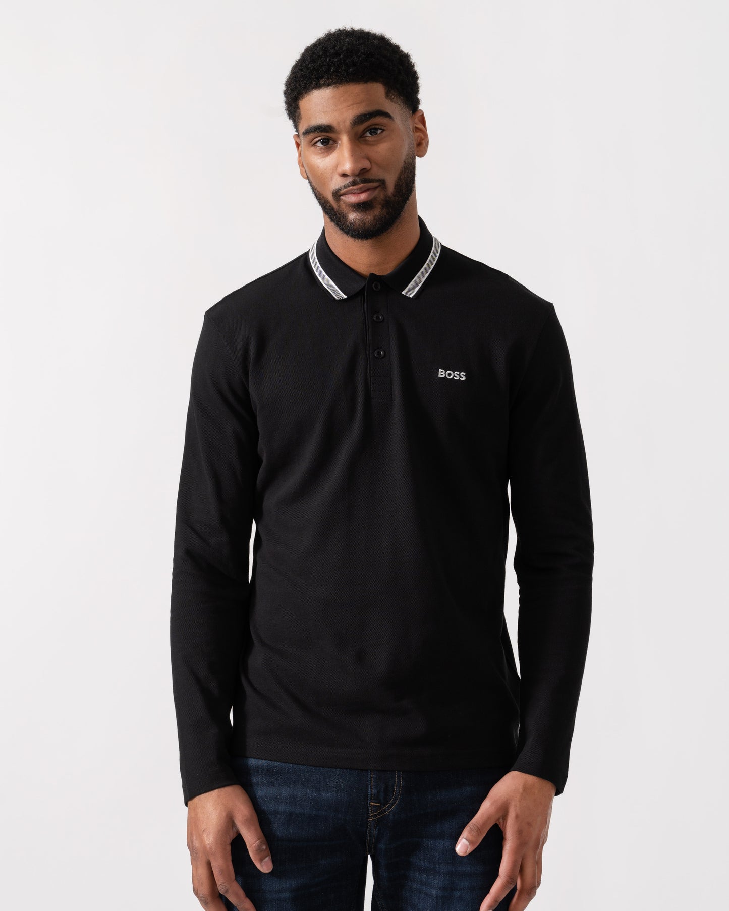 Model wearing BOSS Green Mens Plisy Long Sleeve Polo Shirt in Black 001 - Main