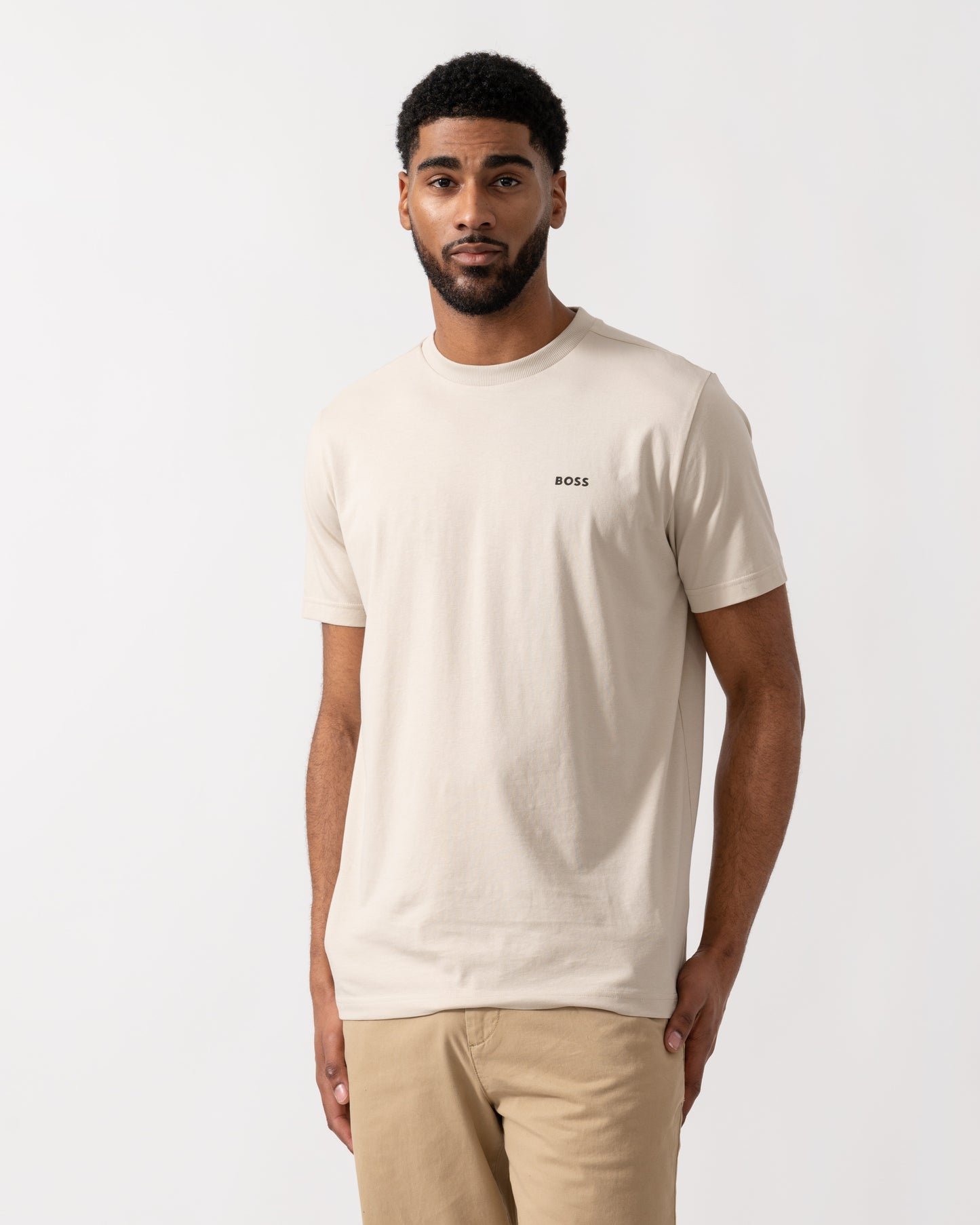 Model wearing BOSS Green Mens Tee Stretch Cotton T-Shirt with Contrast Logo in Light Beige 275 - Main