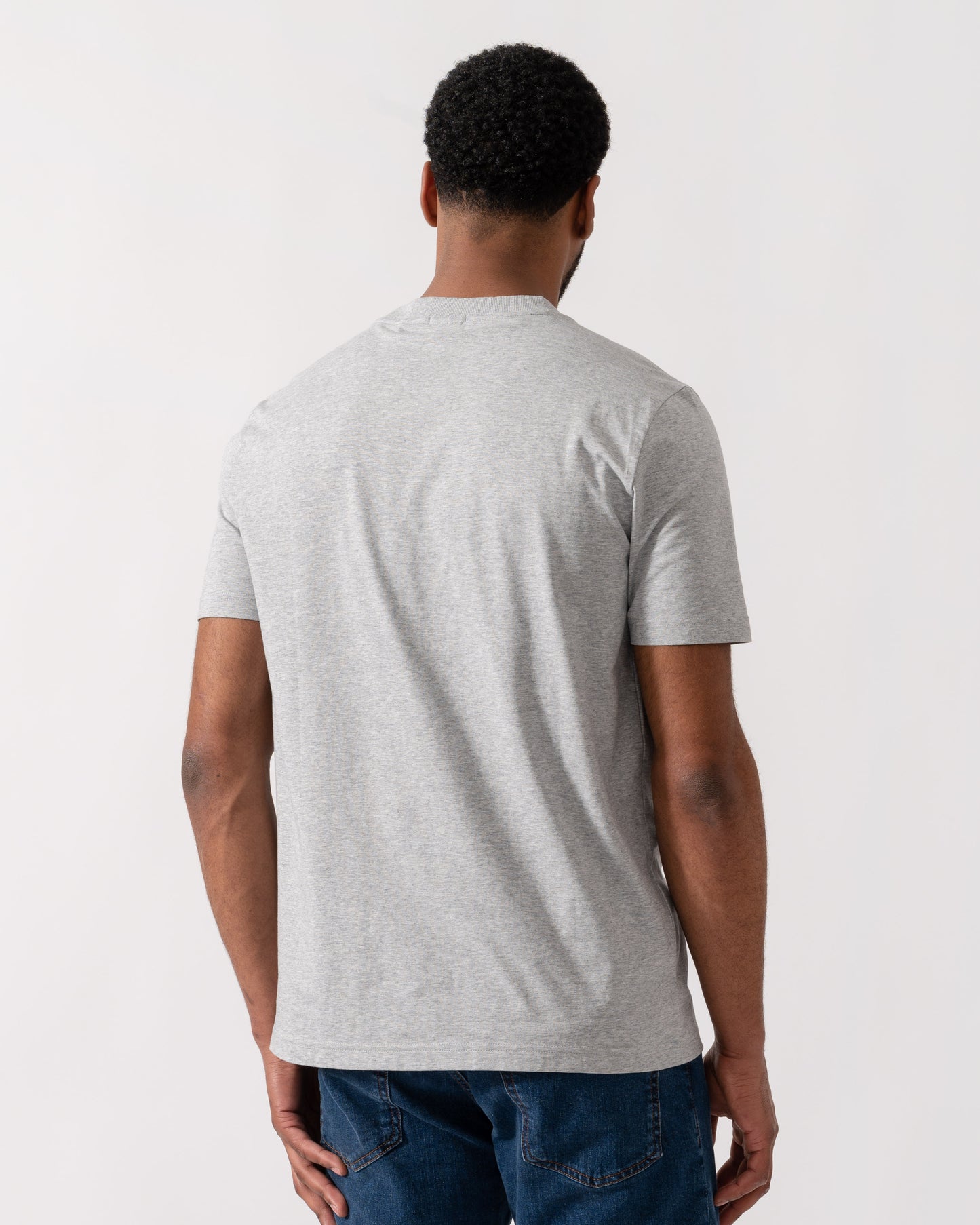 Model wearing BOSS Green Mens Tee Stretch Cotton T-Shirt with Contrast Logo in Silver 043 - Back