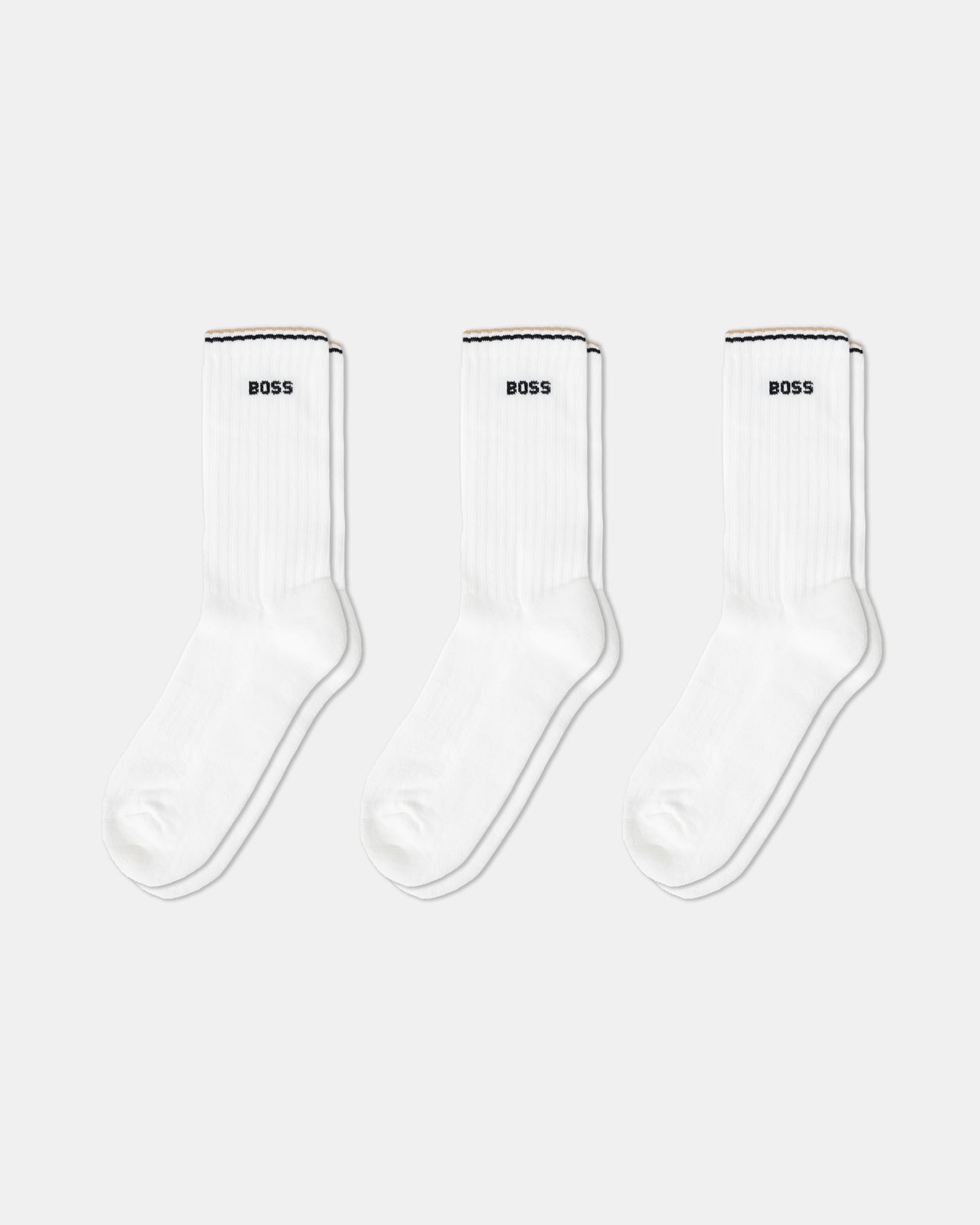 Three pairs of white socks with 'BOSS' branding on a white background