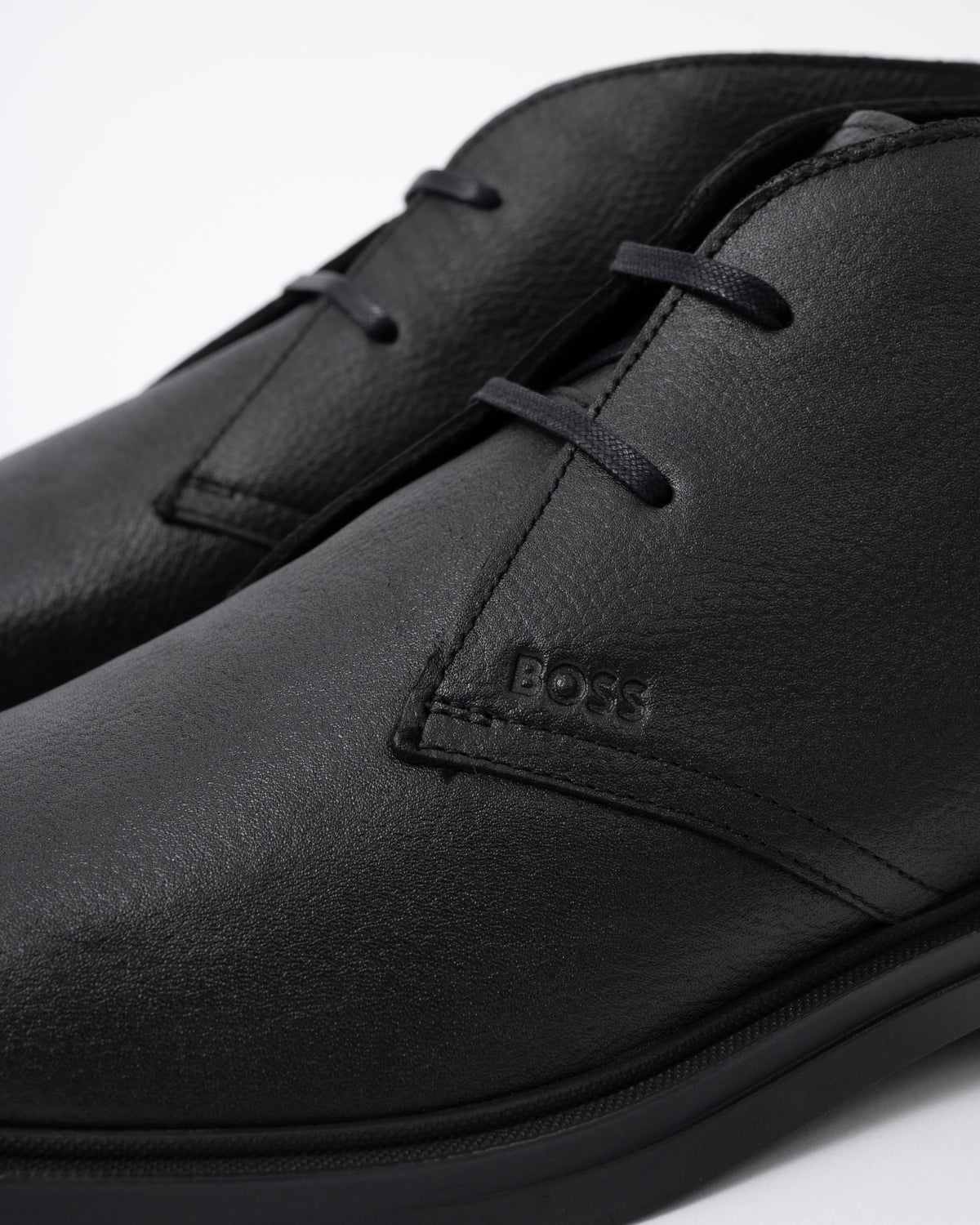 Logo of the BOSS Orange Calev Desb Grwl Mens Boots - Black 001