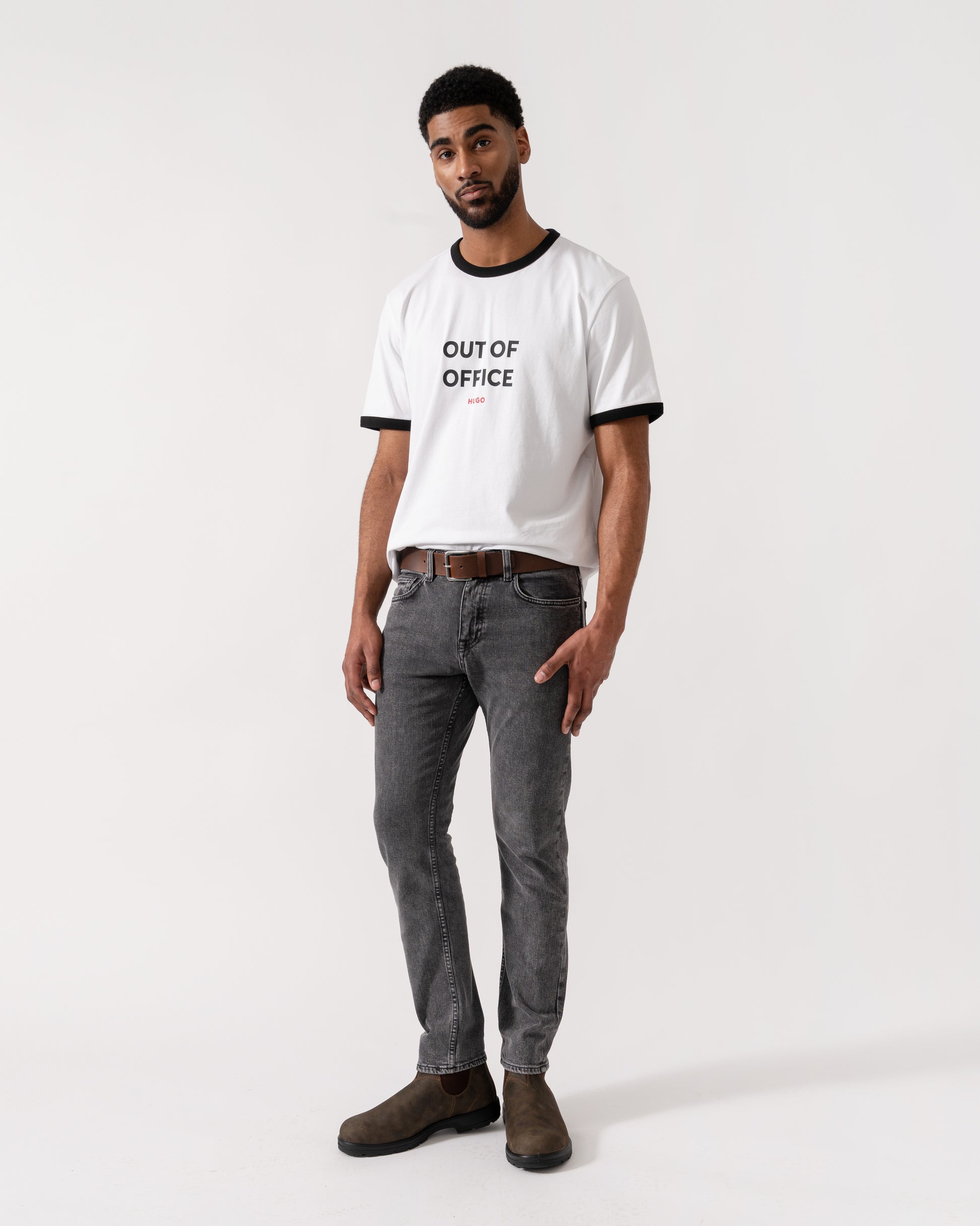 Model wearing BOSS Orange Washed Delaware Jeans in Dark Grey 022 - full length