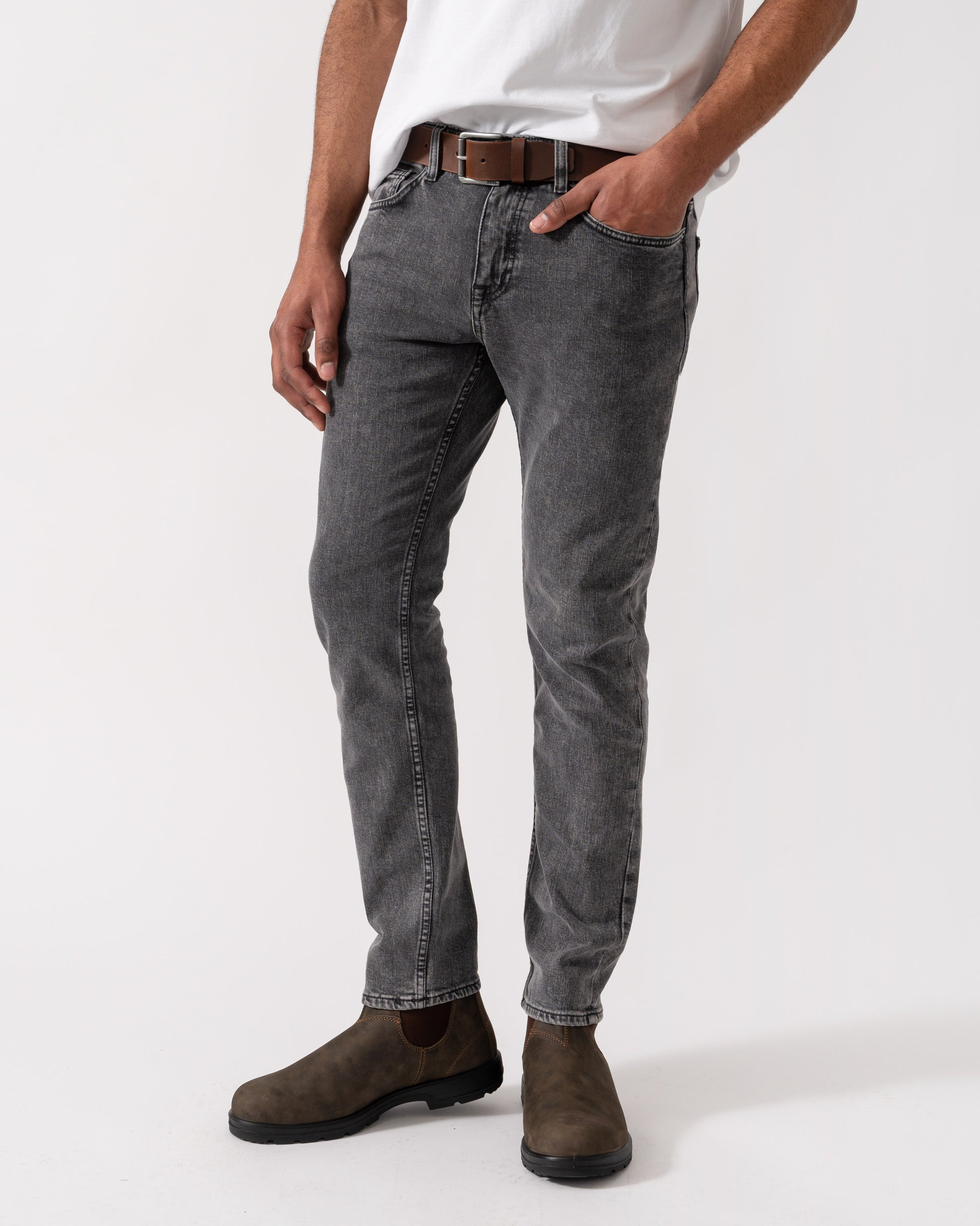Model wearing BOSS Orange Washed Delaware Jeans in Dark Grey 022 - Main