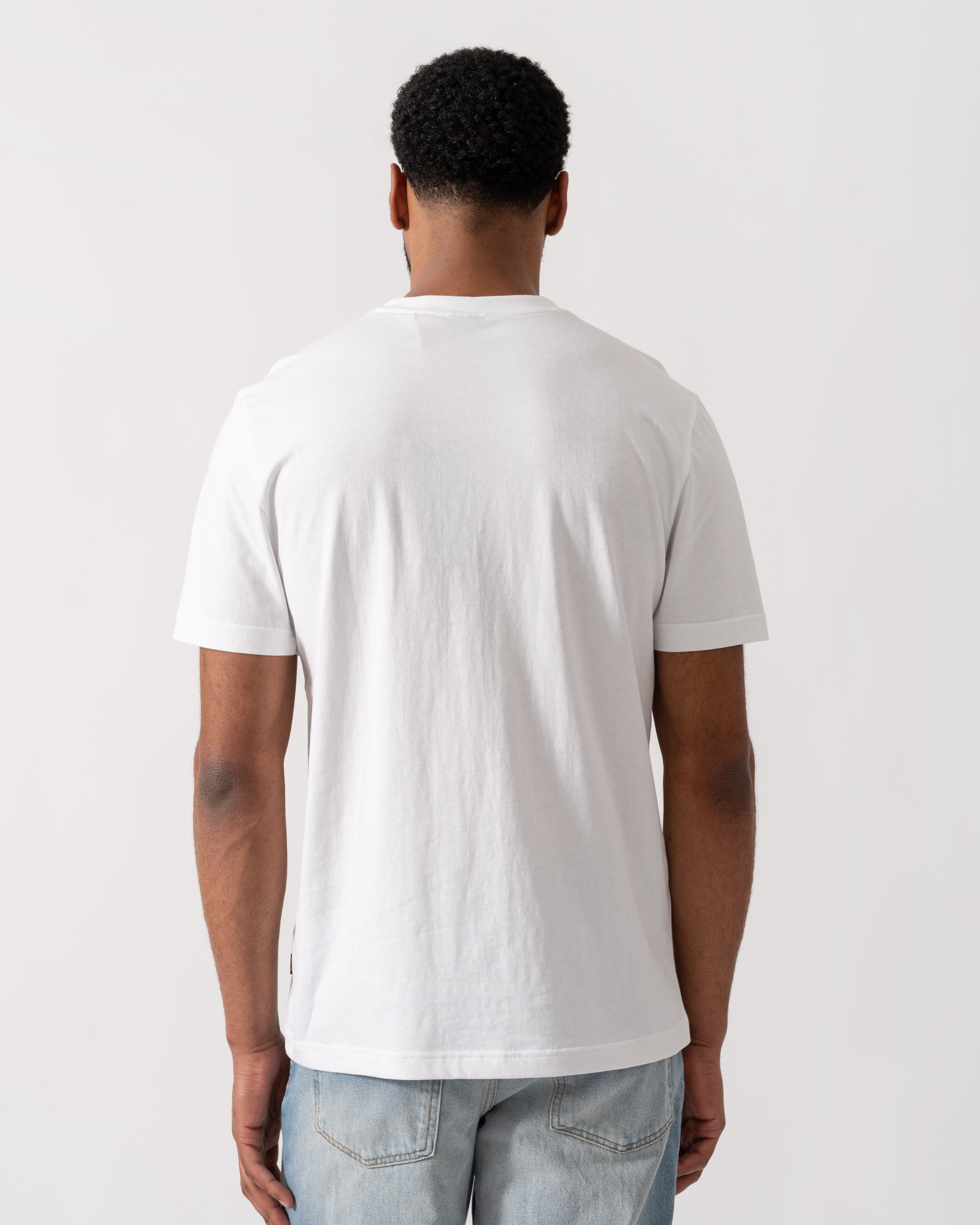 Model wearing BOSS Orange Dobermann Graphic T-Shirt in White 100 - back