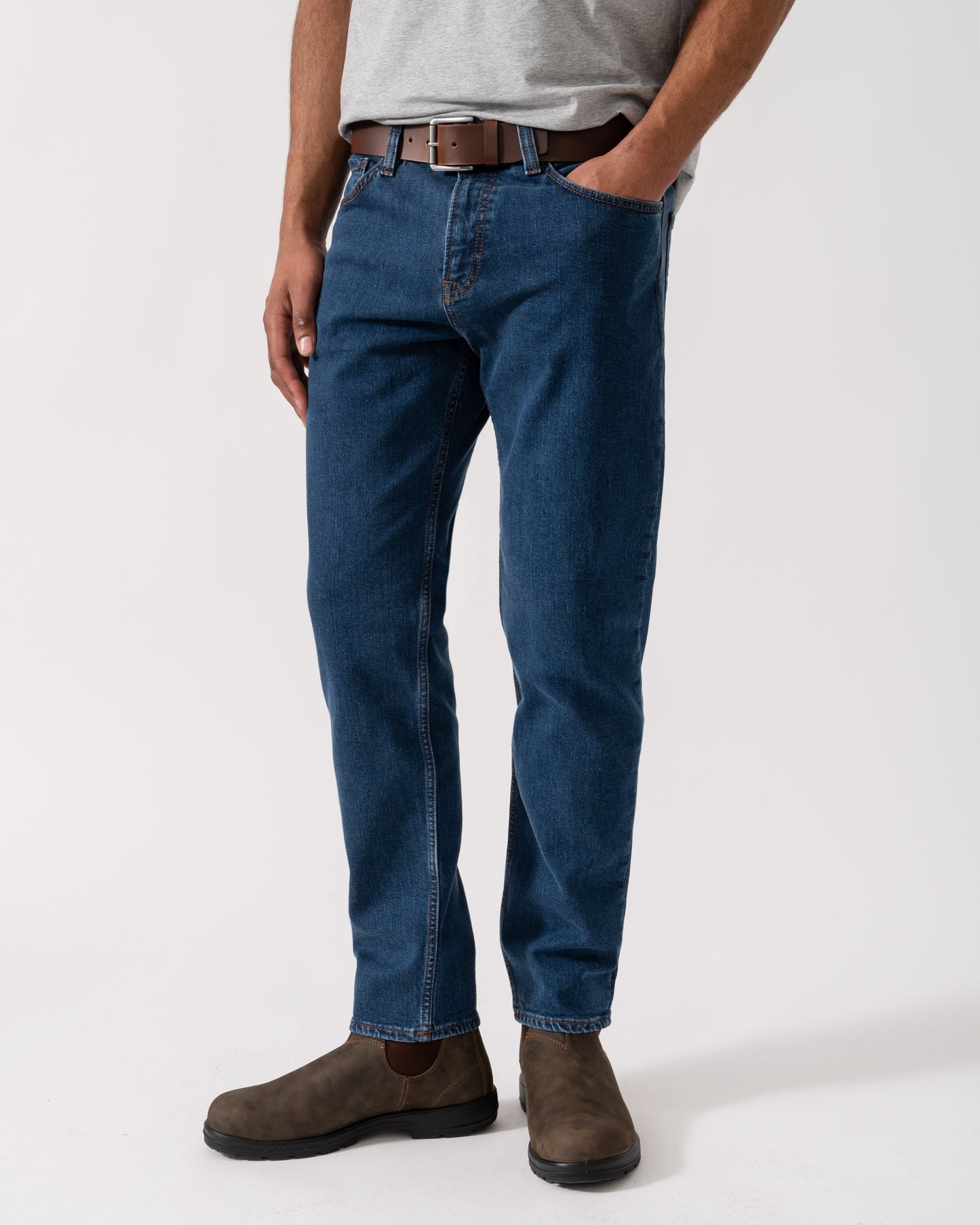 Model wearing BOSS Orange Mens ReMaine Jeans in Dark Blue 409 - Main