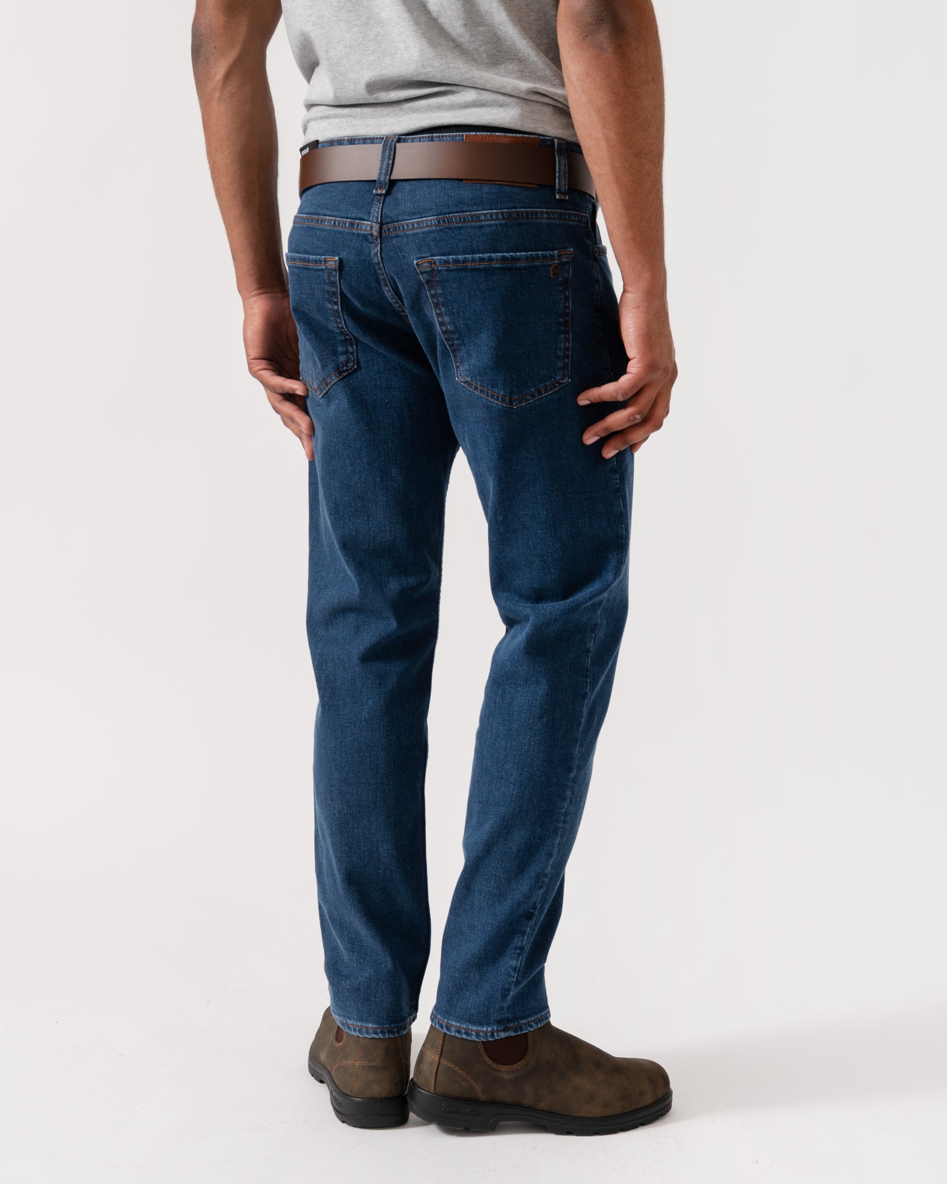 Model wearing BOSS Orange Mens ReMaine Jeans in Dark Blue 409 - Back