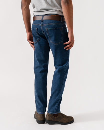 Model wearing BOSS Orange Mens ReMaine Jeans in Dark Blue 409 - Back