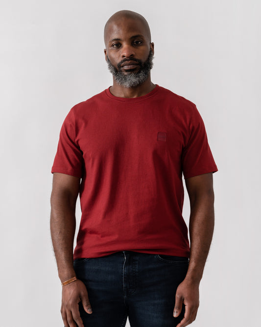Model wearing BOSS Orange Tales Mens Cotton-Jersey T-shirt With Logo Patch in Dark Red 605 - Main
