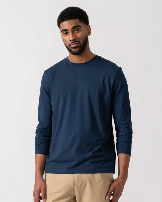 Model wearing BOSS Orange Tchark Long Sleeve Stretch Cotton T-Shirt in Open Blue 464 - Main