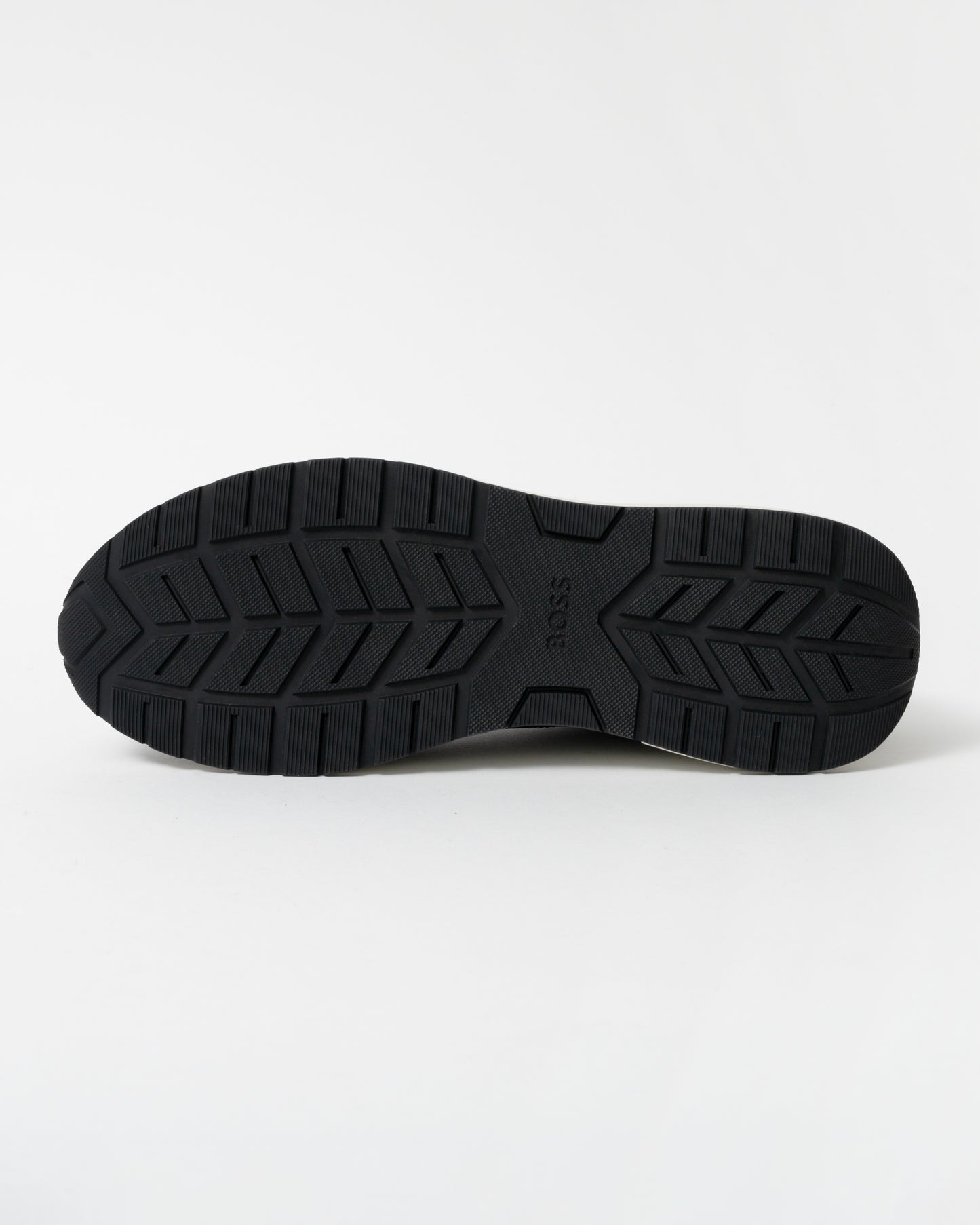 Black shoe sole with brand logo on a white background