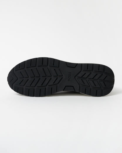 Black shoe sole with brand logo on a white background