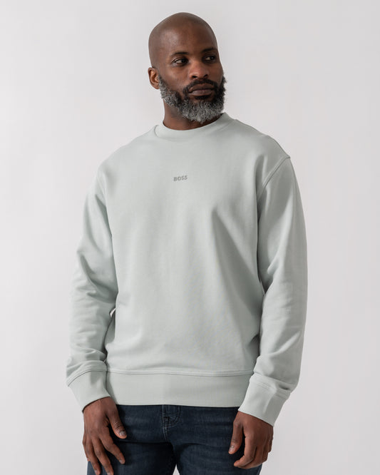 Model wearing BOSS Orange WeSmallcrew Mens Sweatshirt in Silver 043 - Main