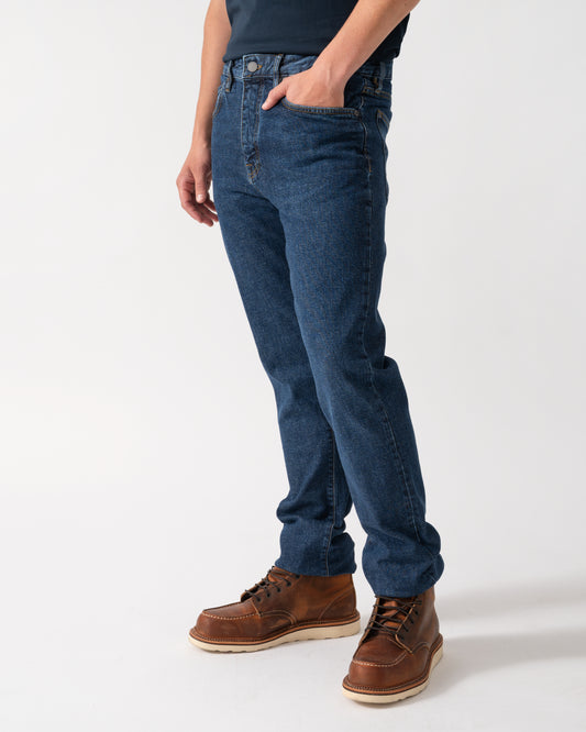 model wearing Belstaff B69 Mens Regular Fit Mid-Rise Jeans in Washed Indigo