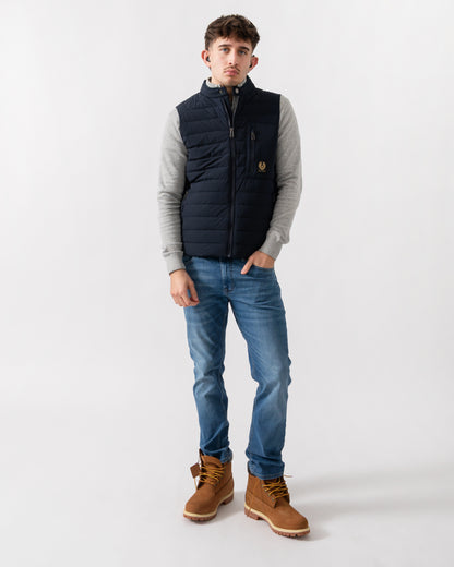 full length shot of a model wearing a Belstaff Chassis Mens Gilet in Dark Ink