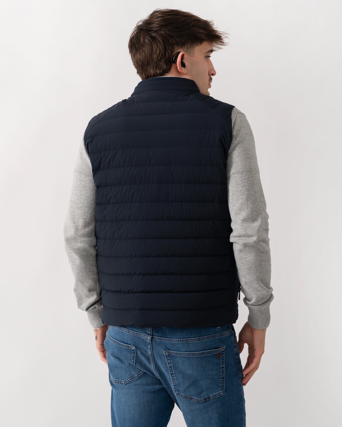 back shot of a model wearing a Belstaff Chassis Mens Gilet in Dark Ink