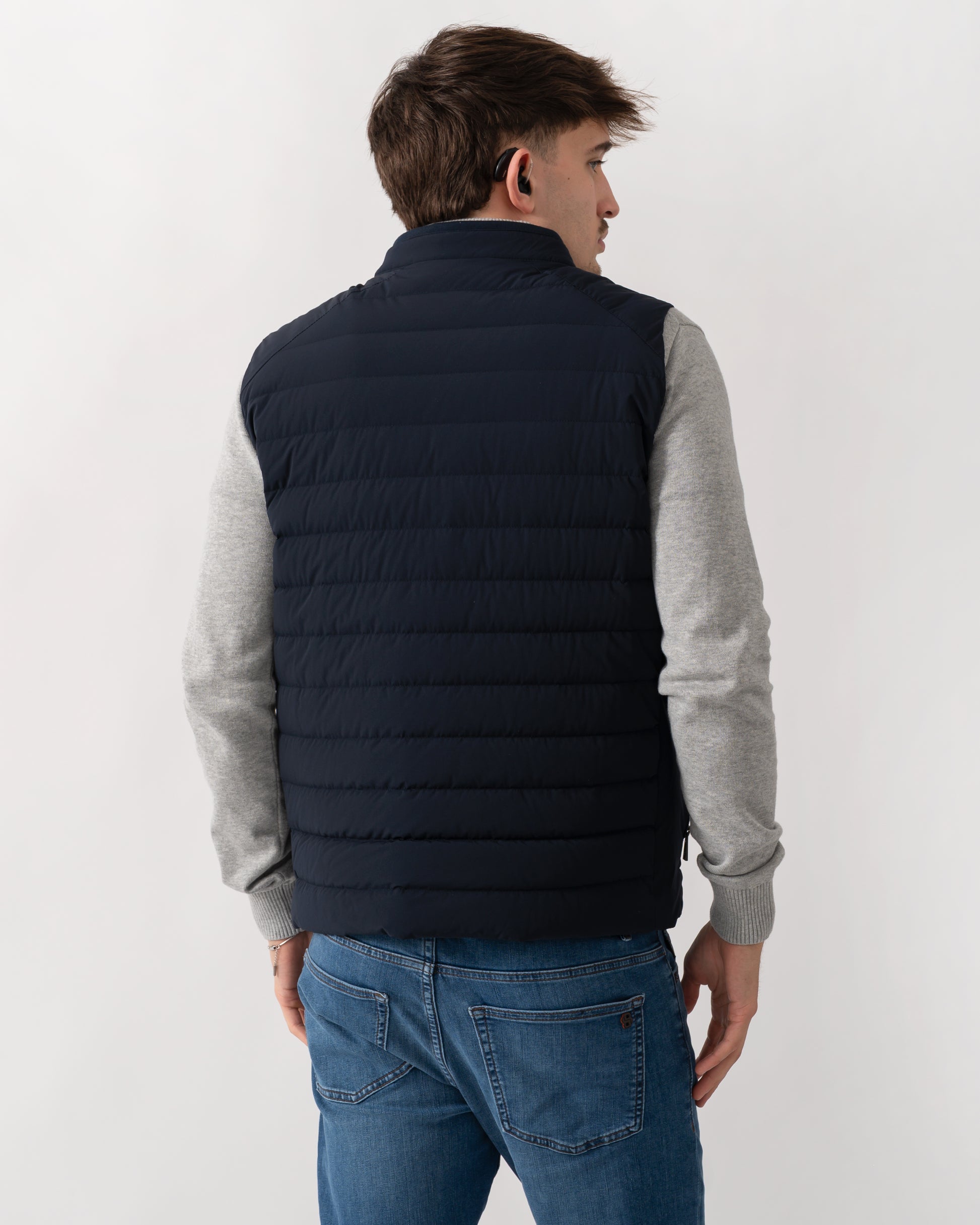 back shot of a model wearing a Belstaff Chassis Mens Gilet in Dark Ink
