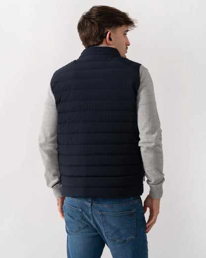 back shot of a model wearing a Belstaff Chassis Mens Gilet in Dark Ink